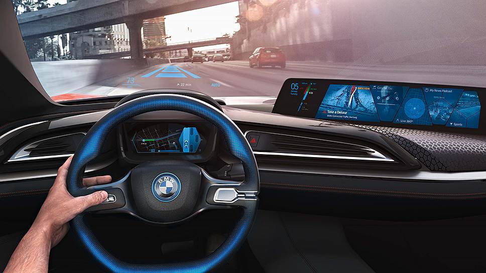 Главная &quot;фишка&quot; концептуального кокпита BMW i Vision - это практически полный отказ от традиционных &quot;аналоговых&quot; органов управления. В распоряжении водителя остался только руль, все остальные органы управления - виртуальные. 

