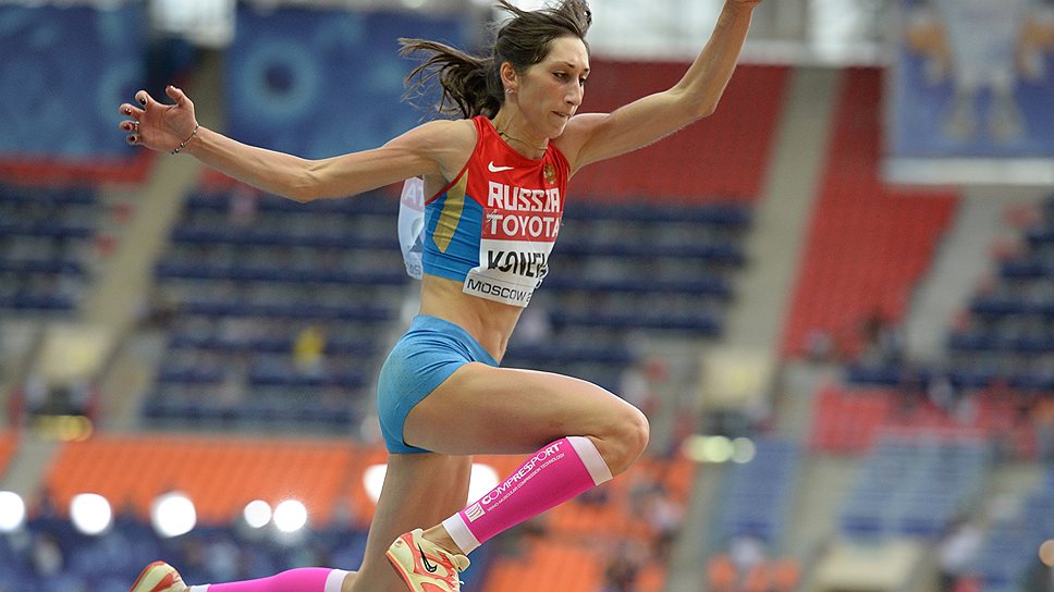  Российсая спортсменка Екатерина Конева во время финальных соревнований в тройном прыжке среди женщин