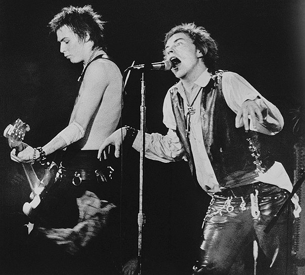 В феврале 1977 Джонни Роттен привел в Sex Pistols нового басиста. Бывший барабанщик Siouxsie and the Banshees Сид Вишес  практически не умел обращаться с бас-гитарой, но его эпатажное поведение и внешний вид идеально подходили имиджу группы. Он дебютировал на «одной из самых нецензурных записей в британской истории» — сингле «God Save the Queen», выпущенным к 25-летию царствования королевы Елизаветы. В честь релиза группа устроила концерт на пароходе, распевая под окнами парламента о «фашистском режиме» и королеве, являющейся «потенциальной водородной бомбой». Сойдя на берег, все участники мероприятия тут же были арестованы. На радио песню запретили, организаторы концертов отказывались работать со скандальной группой, но сингл занял в Великобритании второе место