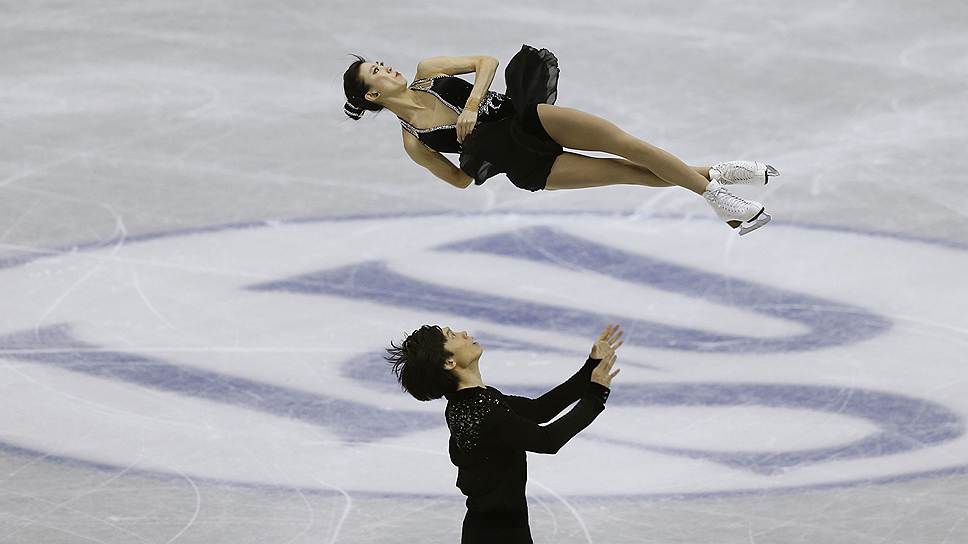 Китайский фигурист Тун Цзянь и его жена Пан Цин соревнуются в Сочи в парном катании. На Играх в Ванкувере они выиграли серебряную медаль