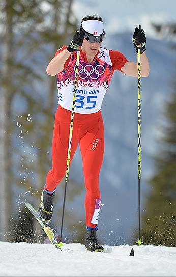 Член сборной команды Швейцарии по лыжным гонкам Дарио Колонья во время соревнований