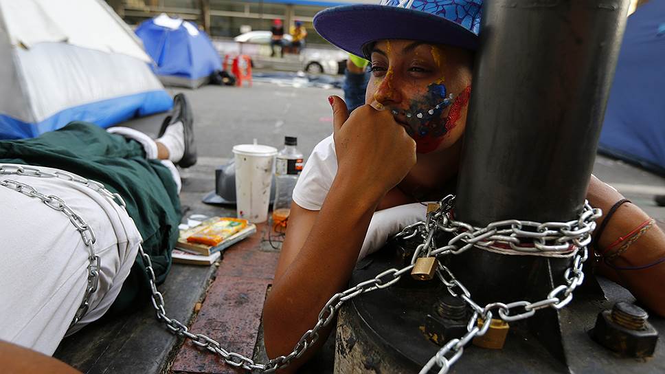 Антиправительственная акция против ограничения прав на проведение манифестаций перед офисом ООН в Каракасе, Венесуэла