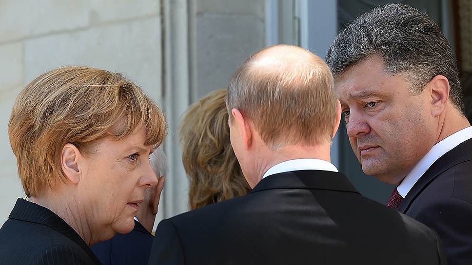 Слева направо: канцлер Германии Ангела Меркель, президент России Владимир Путин и избранный президент Украины Петр Порошенко