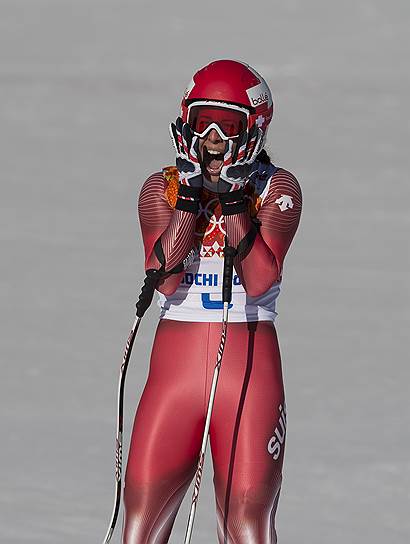 Доминик Гизин (Швейцария) финишировала в заезде соревнований по скоростному спуску среди женщин, разделив золотую медаль с Тиной Мазе (Словения)&lt;br>Экстрим-парк «Роза-хутор», 12 февраля 2014 года