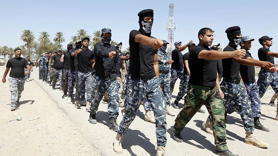 Шиитские добровольцы, которые присоединились к иракской армии для борьбы с боевиками «Исламского государства» в Багдаде