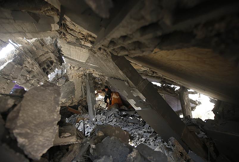 Дом, разрушенный, по данным палестинской полиции, в результате авиаудара израильских ВВС, сектор Газа