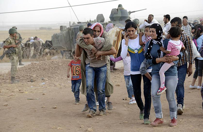 Поддержка турецких курдов помогла отбить нападение террористов на город Кобани в июле