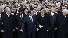 Погибших в парижских терактах почтили минутой молчания