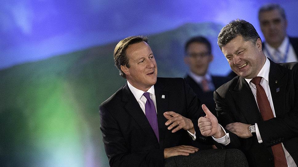 Премьер-министр Великобритании Дэвид Кэмерон: «Мы должны послать четкий сигнал российскому правительству, что все, что имело место в Крыму, является неприемлемым и будет иметь последствия» &lt;i>(6 марта 2014 года перед началом чрезвычайного саммита ЕС в Брюсселе)&lt;/i>&lt;br>На фото: премьер-министр Великобритании Дэвид Кэмерон и президент Украины Петр Порошенко на саммите НАТО в Ньюпорте 4 сентября 2014 года 