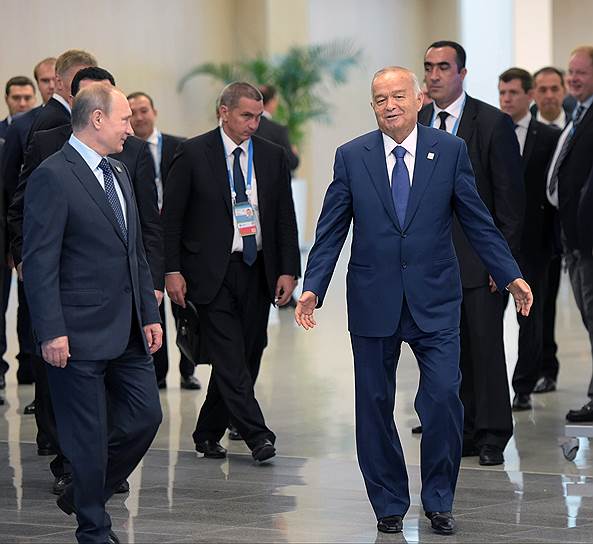 Президент России Владимир Путин (слева) и президент Узбекистана Ислам Каримов (справа)
