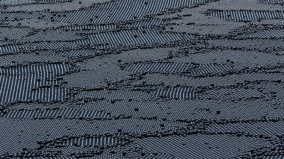 Лос-Анджелес, США. Поверхность городского водохранилища, укрытая 90 миллионами черных пластиковых шариков диаметром 10 см. Предполагается, что черные шарики защитят воду от солнечного света, вызывающего рост водорослей и другие проблемы