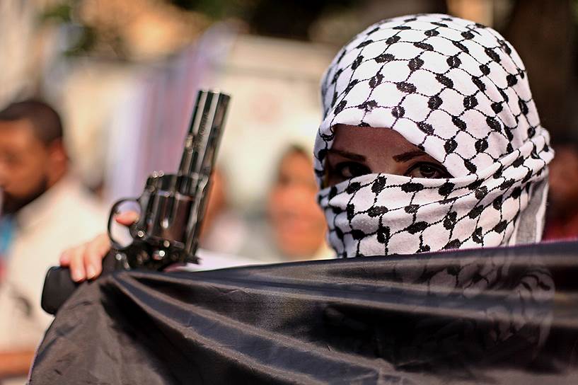 Газа, Палестина. Девушка, принимающая участие в антиизраильской манифестации