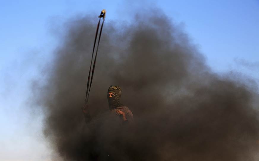 Палестина. Демонстрант во время столкновений с израильскими военными
