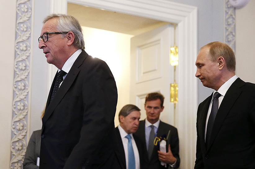Председатель Еврокомиссии Жан-Клод Юнкер (слева) и президент России Владимир Путин