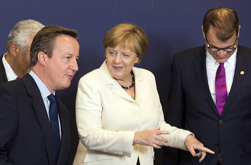 Слева направо: премьер-министр Великобритании Дэвид Кемерон и канцлер ФРГ Ангела Меркель
