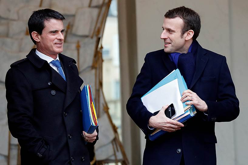 Бывший премьер-министр Манюэль Вальс (слева) и кандидат в президенты Франции Эмманюэль Макрон