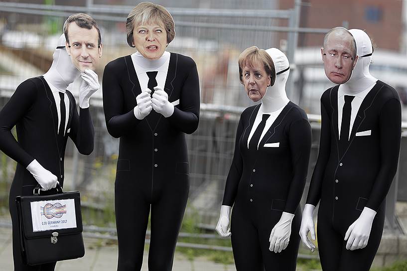Антиглобалисты в масках лидеров стран G20