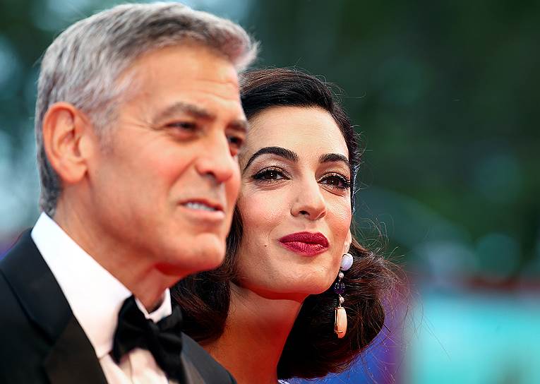 Актер и режиссер Джордж Клуни с супругой Амаль