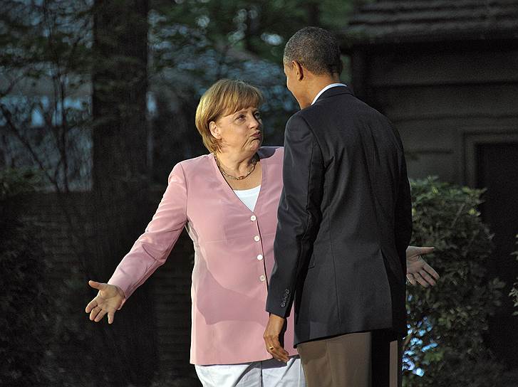 Май 2012 года. Разговор между Ангелой Меркель и президентом США Бараком Обамой (2009—2016) перед началом заседания лидеров стран на саммите G8 в Кэмп-Дэвиде (США)