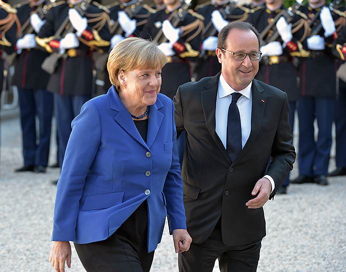 Октябрь 2015 года. Госпожа Меркель и президент Франции Франсуа Олланд (2012—2017) во время официальной встречи лидеров стран &quot;нормандской четверки&quot;