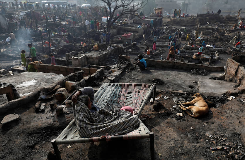 Карачи, Пакистан. Последствия пожара в городских трущобах 