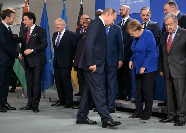 Президент России Владимир Путин (в центре) на Берлинской международной конференции по Ливии