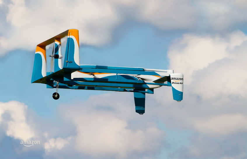 Беспилотник Amazon Prime Air спсобен поднять груз весом 2,2 кг и перевезти его от склада до клиента за полчаса на расстояние примерно 12 км