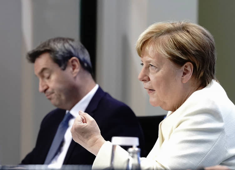Канцлер Германии Ангела Меркель и лидер Баварии Маркус Зёдер