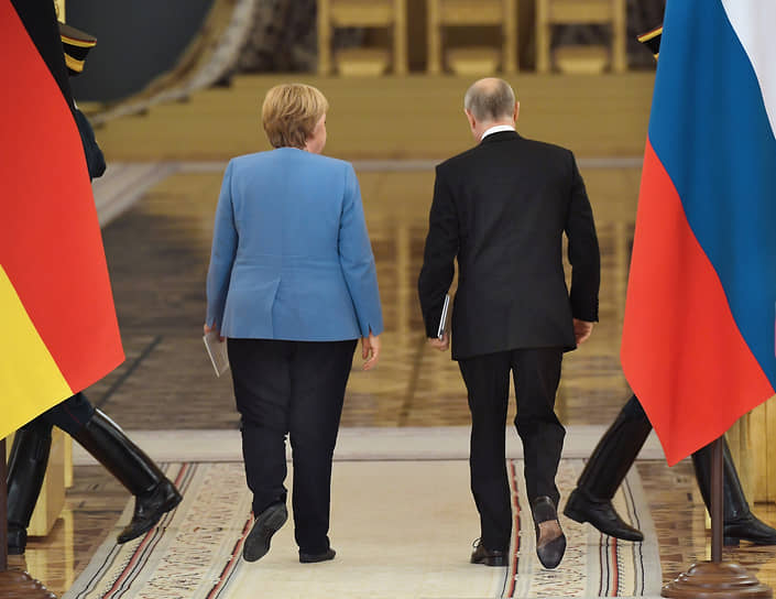 Президент России Владимир Путин и канцлер Германии Ангела Меркель на встрече в Кремле