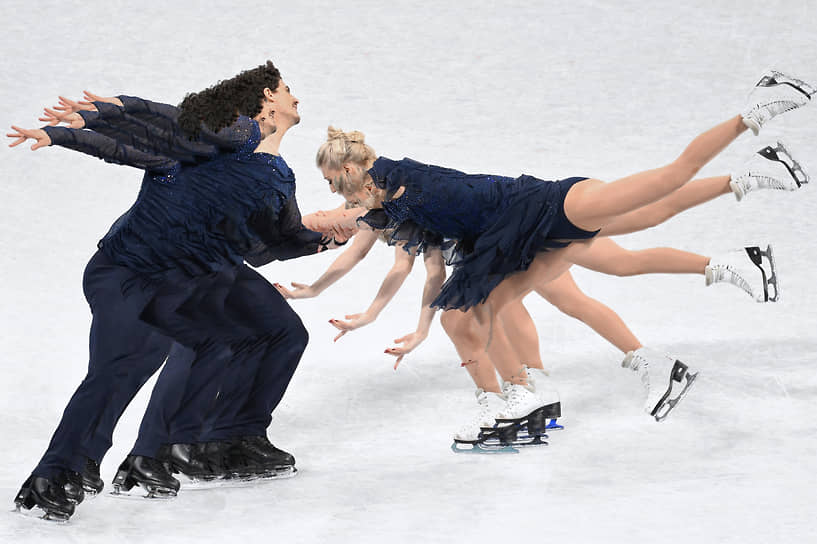 Канадские фигуристы Пайпер Жиль и Поль Пуарье во время выступления с произвольной программой танцев на льду