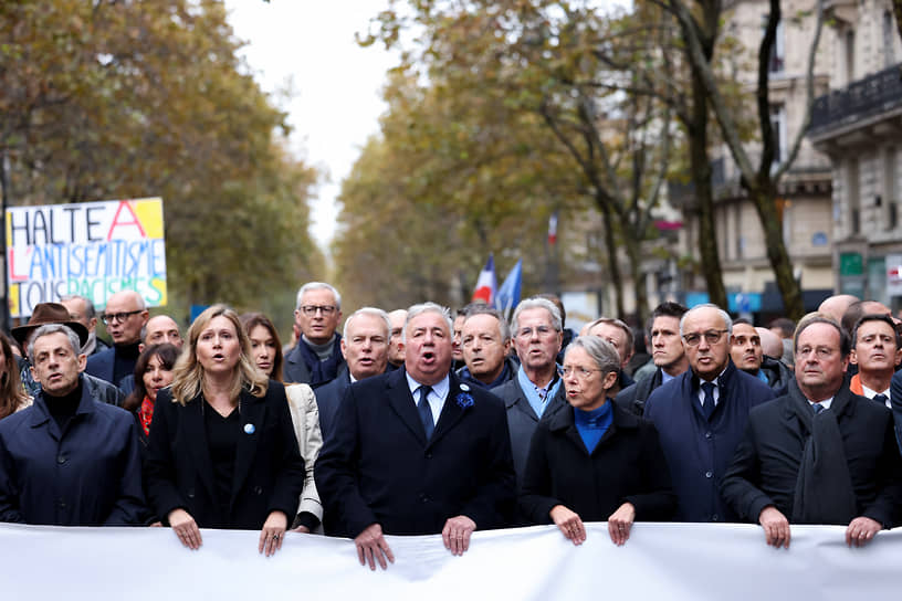 В марше против антисемитизма участвовали видные политики Французской республики: бывший президент Франсуа Олланд, премьер-министр Элизабет Борн, председатели Сената Жерар Ларше и Национальной Ассамблеи Яэль Браун-Пиве и экс-президент Николя Саркози (справа налево)