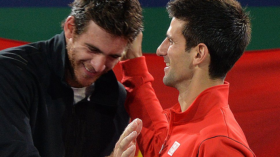 Новак Джокович (справа) выиграл второй турнир подряд серии Masters, а Хуан Мартин дель Потро благодаря выходу в финал в Шанхае квалифицировался на итоговый турнир года в Лондоне 