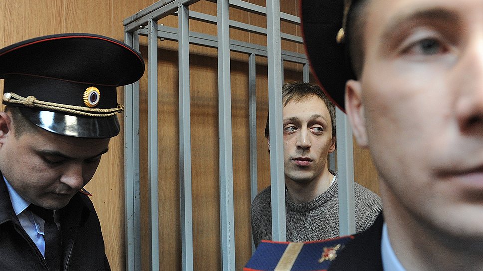 Солиста Большого театра Павла Дмитриченко (в центре) следствие считает заказчиком нападения на худрука Сергея Филина 