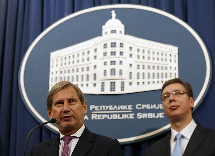 Еврокомиссар по расширению Йоханнес Хан (слева)