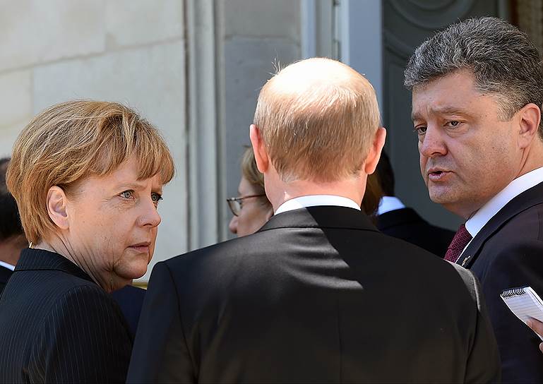 Канцлер Германии Ангела Меркель, президент России Владимир Путин и президент Украины Петр Порошенко
