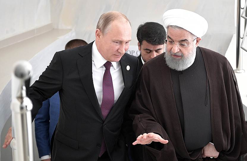 Президенты России и Ирана Владимир Путин (слева) и Хасан Роухани (справа) воспользовались случаем и помимо Каспия обсудили ситуацию в Сирии и поведение США
