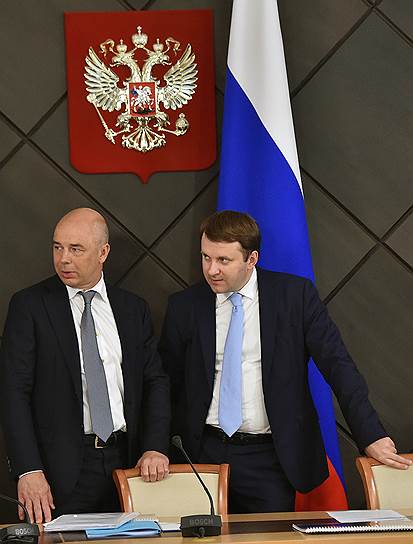 Минэкономики, возглавляемое Максимом Орешкиным (справа), переписало по поручению первого вице-премьера Антона Силуанова тарифный законопроект ФАС
