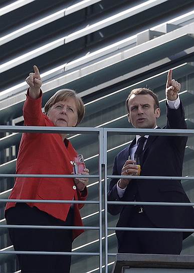Канцлер Германии Ангела Меркель и президент Франции Эмманюэль Макрон преодолели разногласия по проекту газовой директивы