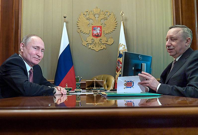 Президент России и врио губернатора Санкт-Петербурга обменивались взаимной теплотой, частички которой доставались даже журналистам