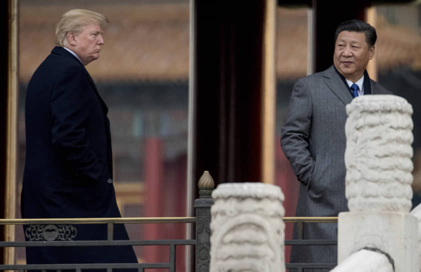 Президент США Дональд Трамп и его соратники уверены, что возвращение к старой модели отношений Вашингтона с Пекином (справа — председатель КНР Си Цзиньпин) уже невозможно