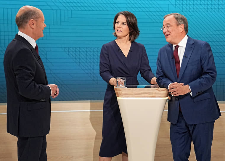 На дебатах кандидат от СДПГ Олаф Шольц (слева) показал себя с наилучшей стороны и понравился избирателям больше, чем его конкуренты — Анналена Бербок и Армин Лашет