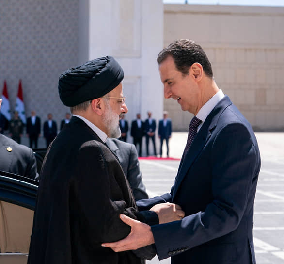 Президенты Башар Асад (справа) и Эбрахим Раиси