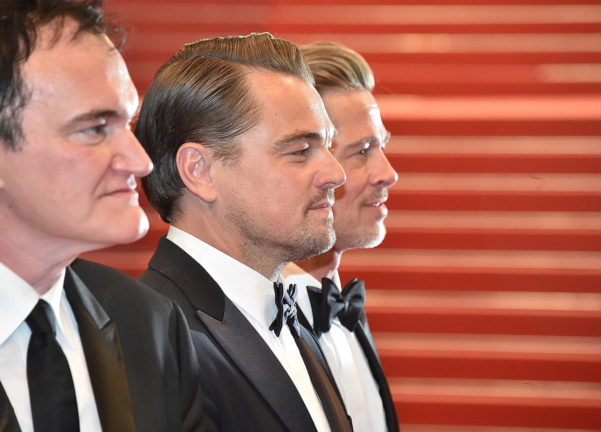 Режиссер Квентин Тарантино, актер Леонардо Ди Каприо и актер Бред Питт на премьере нового фильма Тарантино «Однажды... в Голливуде»