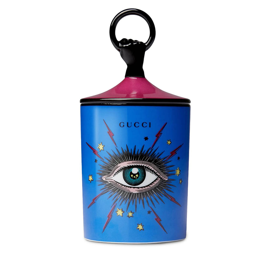 Gucci, свеча Fumus Star Eye, 23 000 руб, farfetch.com