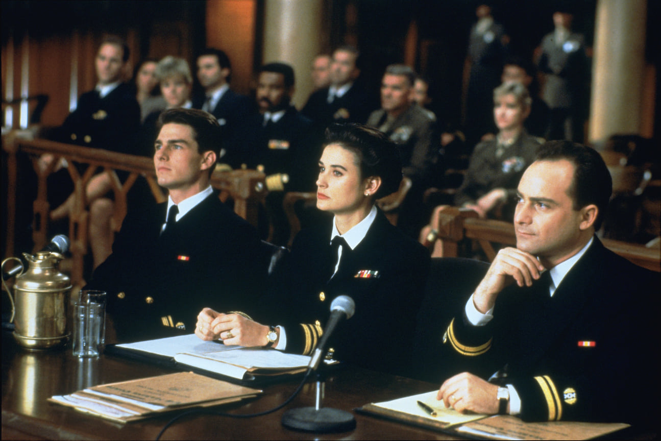 Слева направо: Том Круз, Деми Мур и Кевин Поллак в фильме «Несколько хороших парней», 1992 год
