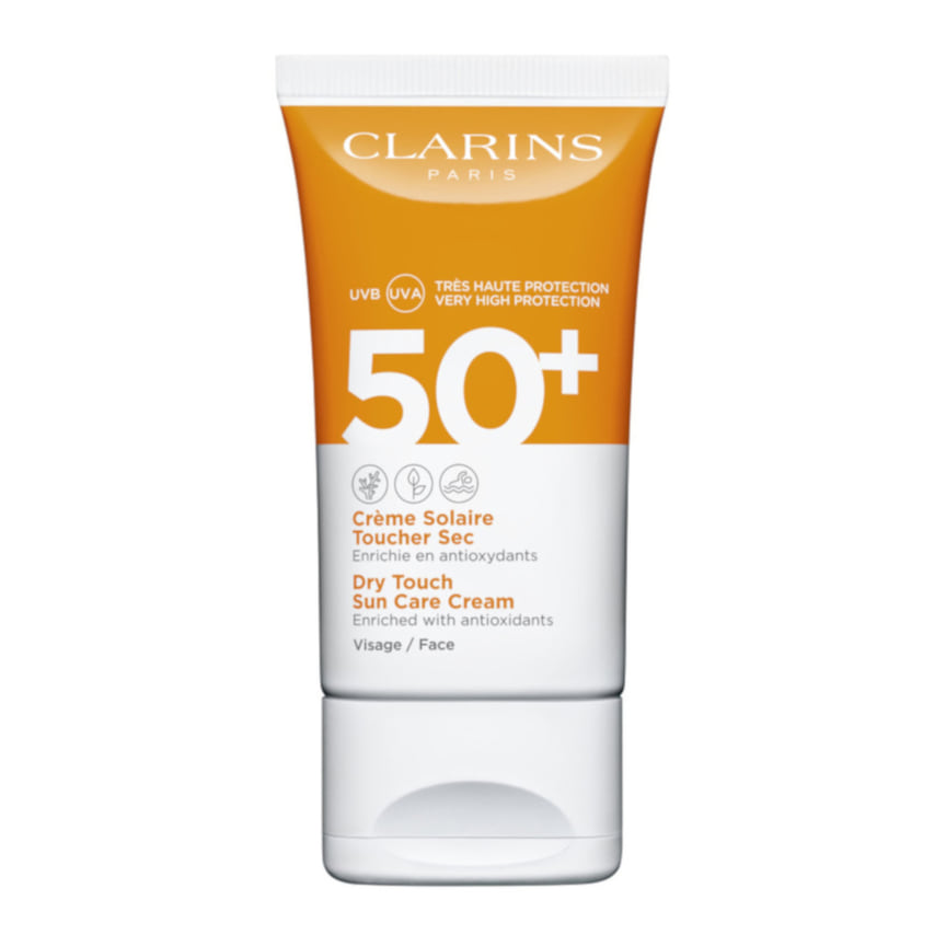 Clarins, солнцезащитный крем для лица SPF 50+Creme Solaire Toucher Sec Visage: защищает кожу от воздействия УФ-лучей и свободных радикалов, увлажняет, помогает приобрести красивый загар. Дает матовое покрытие и подходит для любого типа кожи.
