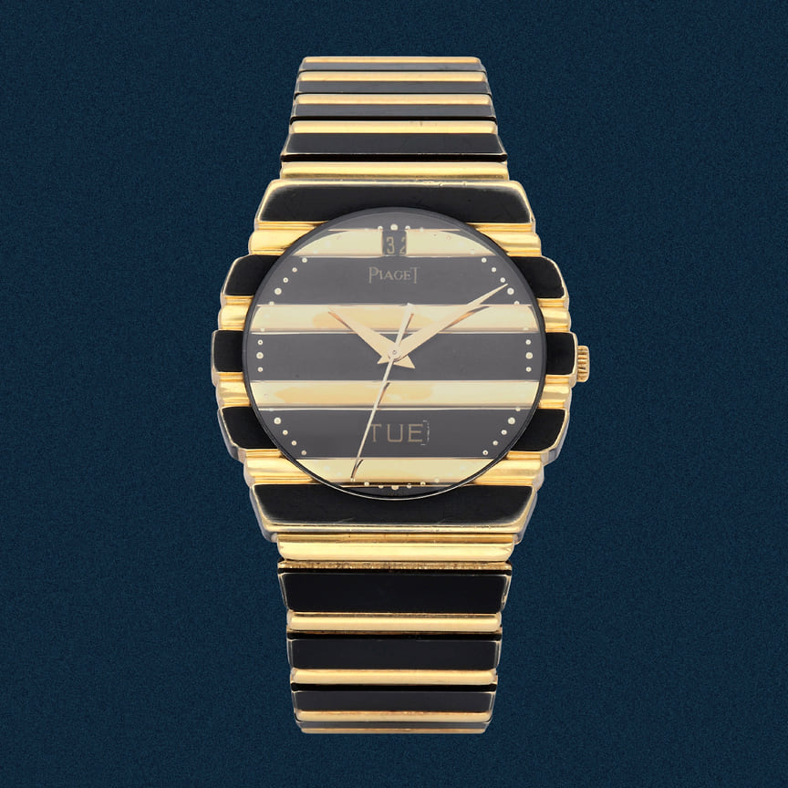 Часы Polo Day Date, Piaget, 1995. Желтое золото с черным DLC-покрытием. Эстимейт 5-10 тыс швейцарских франков
