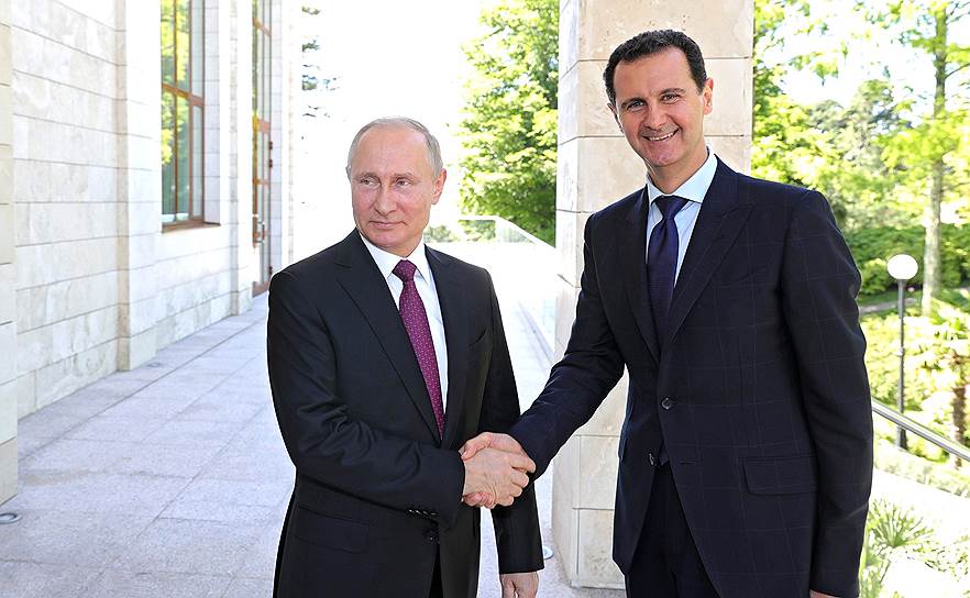 Президенты России и Сирии Владимир Путин и Башар Асад