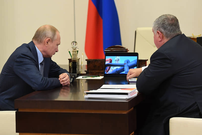 Президент России Владимир Путин и глава "Роснефти" Игорь Сечин