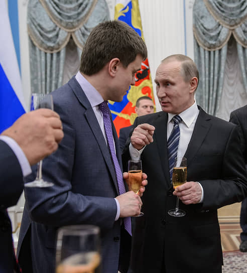 Михаил Котюков (слева) и Владимир Путин в 2016 году